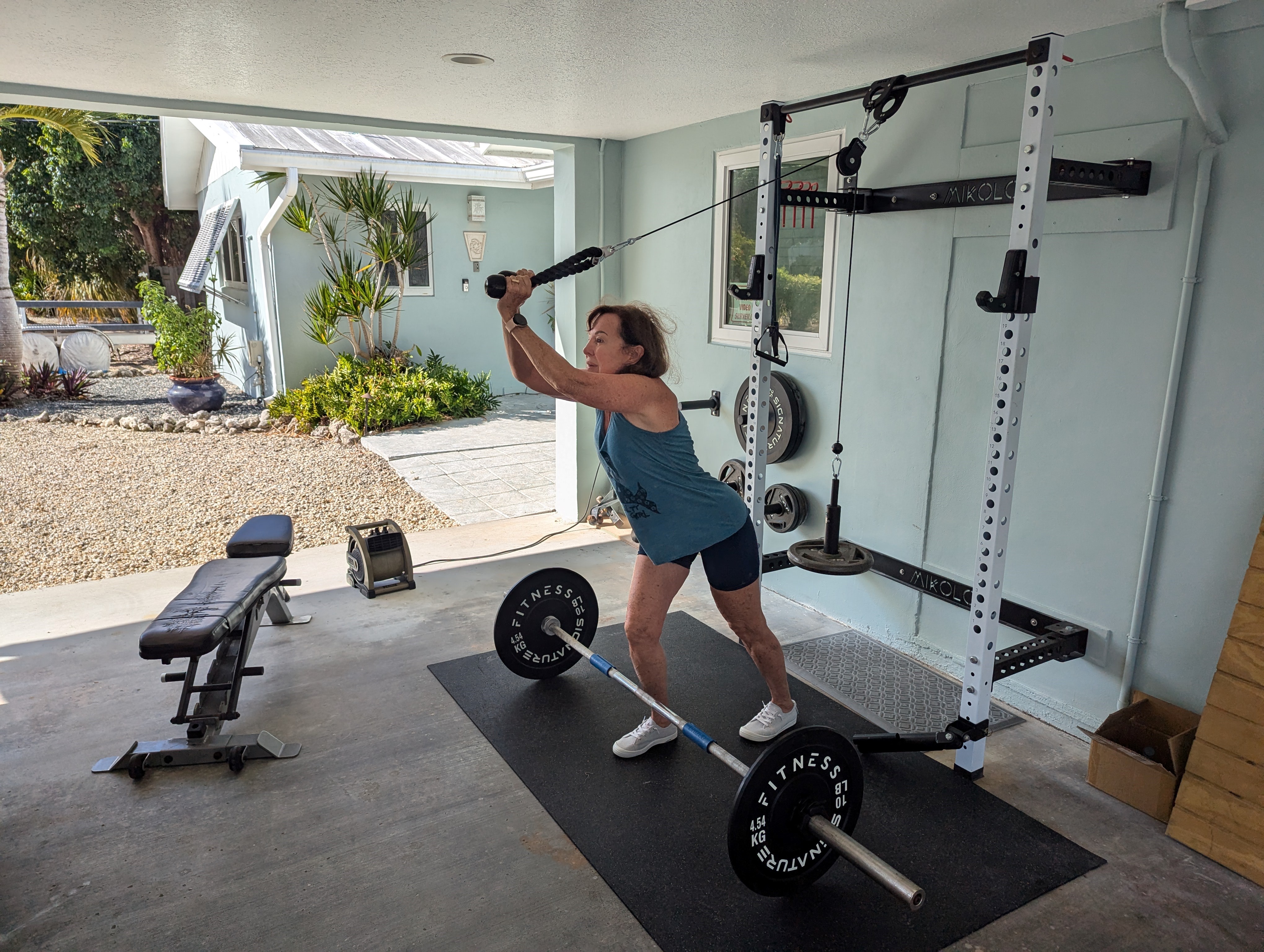 Home gym can be uncovered on the carport and set up for your use.<br>Weights, pulley, accessories, mat and workout bench are included.