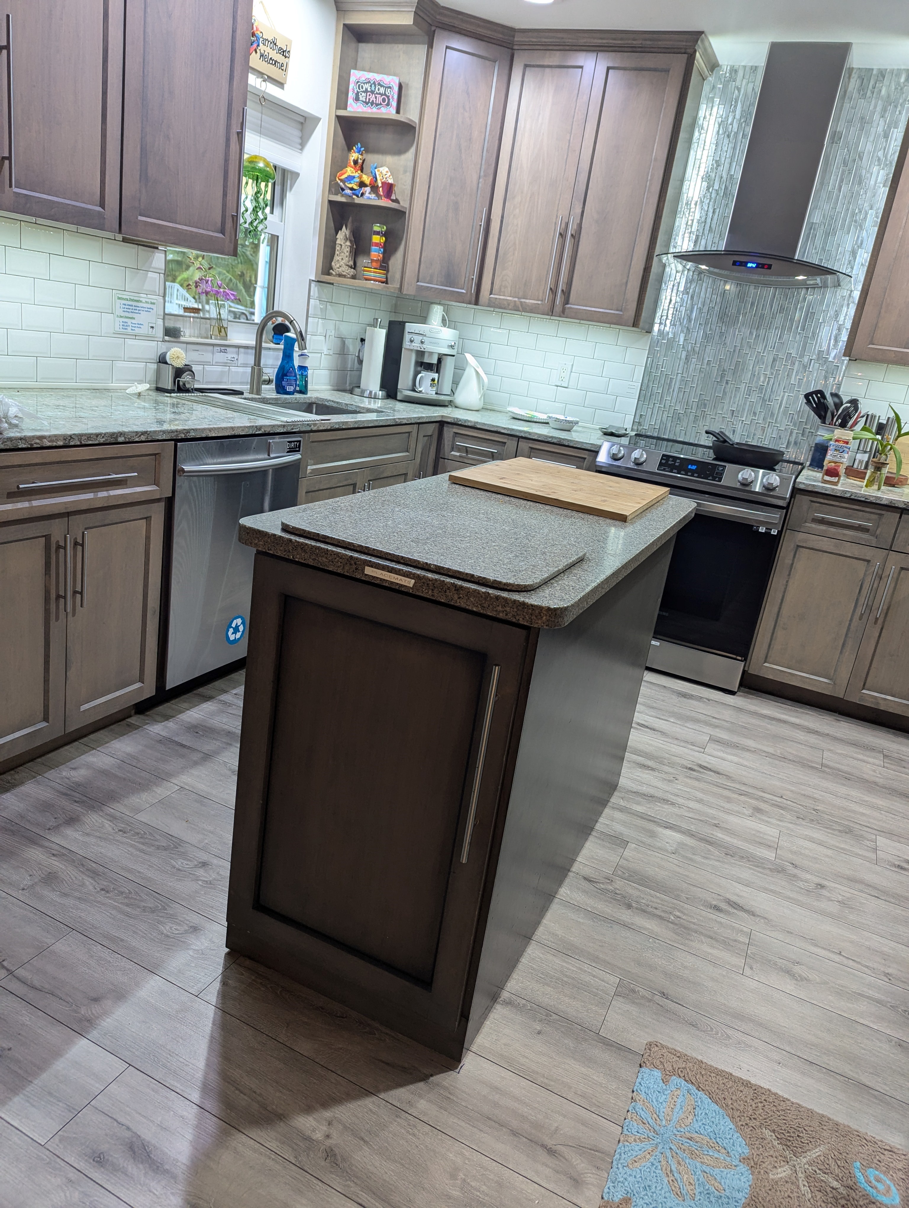 Kitchen includes new Samsung appliances, and an empty pantry for your groceries